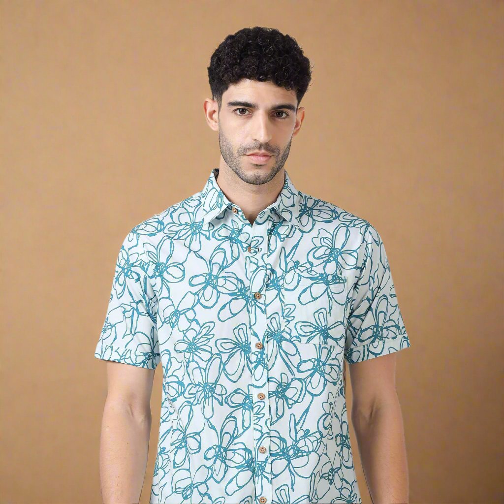 Ashley Cotton Half Sleeves Shirt In Teal Floral Print Men’s floral half sleeves shirt by TFC